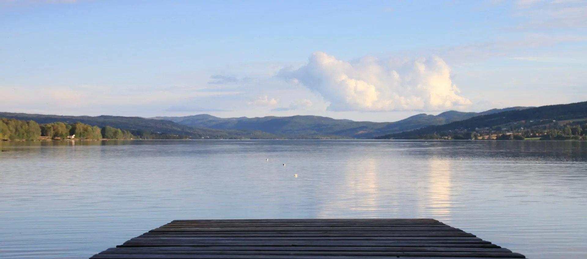 The Environmental Impact of Dredging A Lake: Balancing Lake Restoration